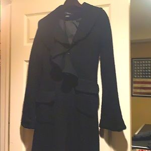 Woman’s black full length coat